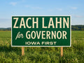 Zach Lahn for Governor barn sign standing in an Iowa field