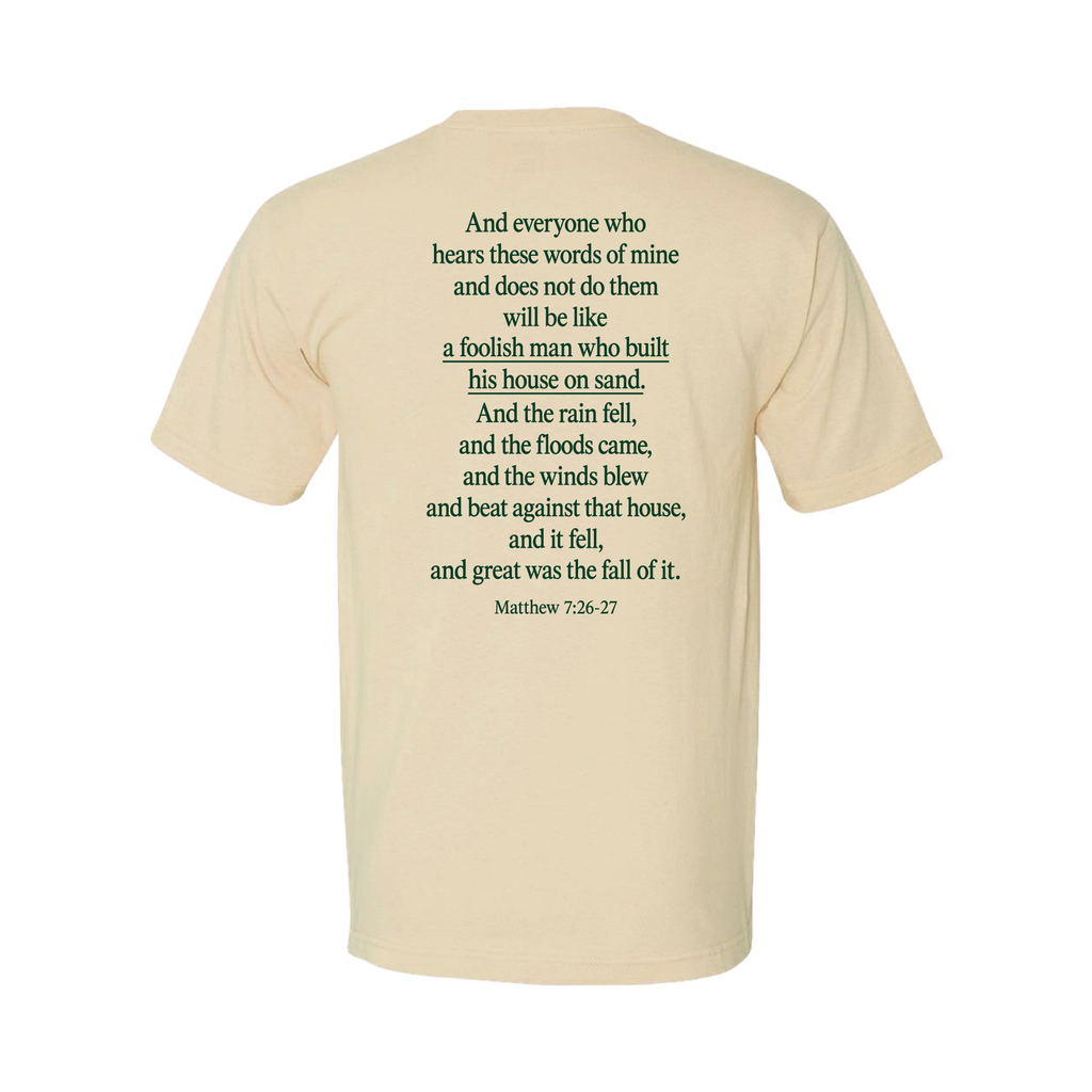Cream tee back with Matthew 7:26-27 printed in forest green